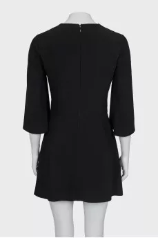 Black dress with gold logo