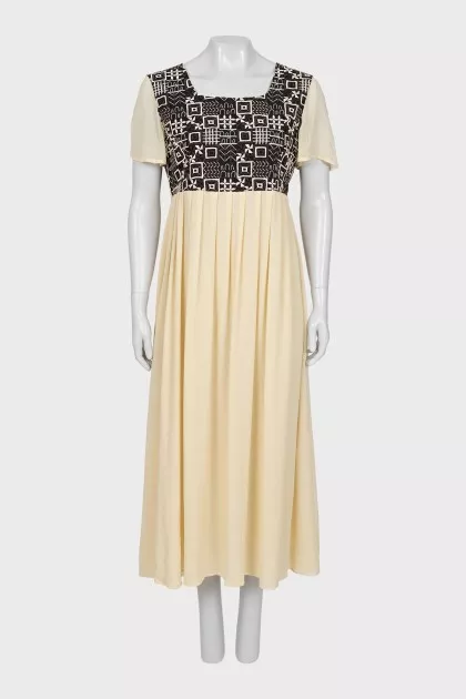 Yellow dress with ornament