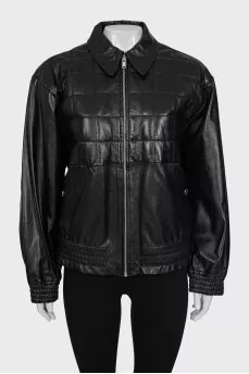 Quilted leather jacket with tag