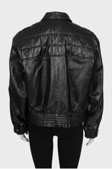 Quilted leather jacket with tag