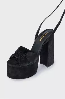 Suede sandals with high soles and heels