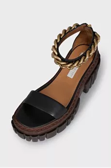 Black sandals with a chunky sole