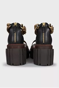 Black sandals with a chunky sole