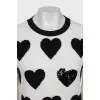 Sweater in black print with sequins