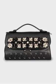 Leather bag with crystals