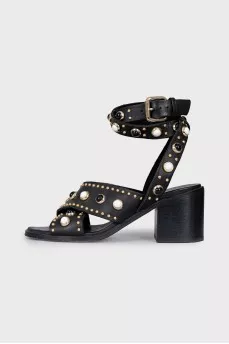 Black leather sandals with decor