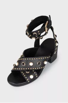 Black leather sandals with decor