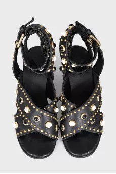 Black leather sandals with decor