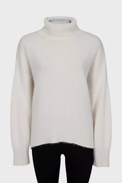 Knitted white turtleneck sweater