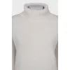 Knitted white turtleneck sweater