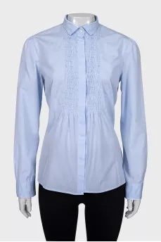Blue shirt with decor