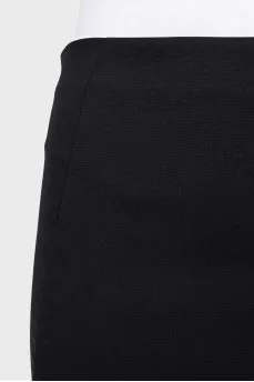 Pencil skirt with a pleat at the back