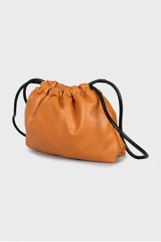 Leather bucket bag with removable strap