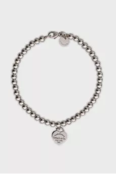 Silver bracelet with heart pendant