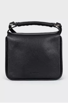 Leather bag with magnetic clasp