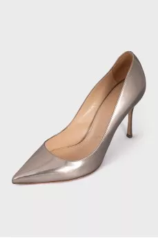 Gold leather pumps
