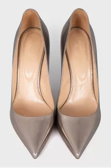 Gold leather pumps