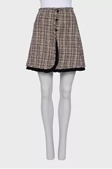 Buttoned skirt with trim