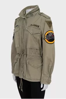 Jacket decorated with patches