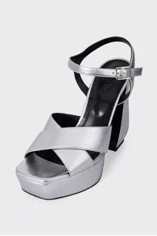 Leather sandals with figured heels