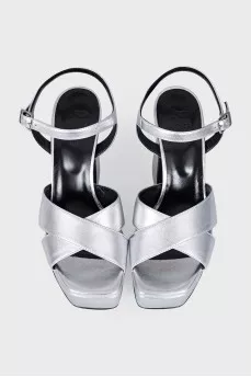 Leather sandals with figured heels