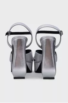 Leather sandals with figured heels
