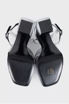 Leather sandals with figured heels