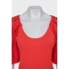 Red jumper with silk sleeves