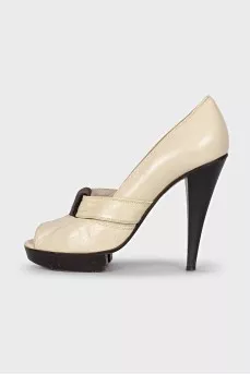 Leather shoes on a wooden platform