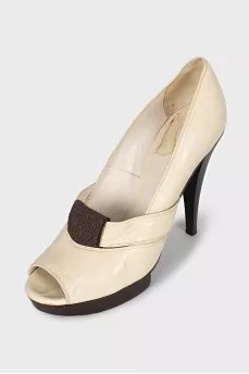 Leather shoes on a wooden platform