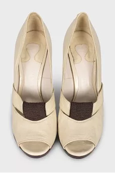 Leather shoes on a wooden platform