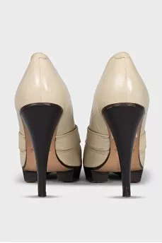 Leather shoes on a wooden platform