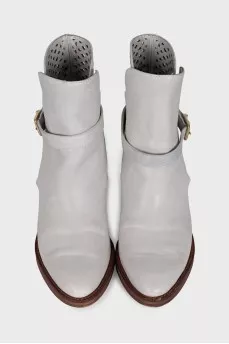 Leather ankle boots with perforated heel