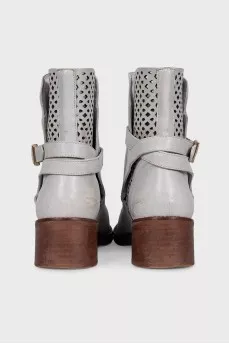 Leather ankle boots with perforated heel