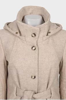 Coat with leather sleeves
