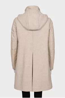 Coat with leather sleeves