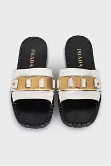 Slippers with metallic decor
