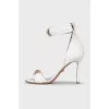 White sandals with gold decor