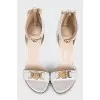 White sandals with gold decor