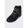 Textile boots decorated with chains