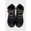 Textile boots decorated with chains