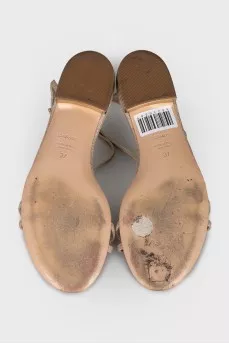 Shiny gold sandals