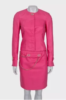 Suit with jacket and skirt decorated with chain