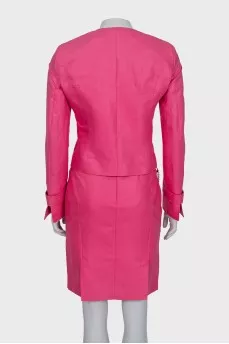 Suit with jacket and skirt decorated with chain