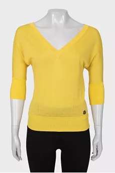 Yellow pullover with a cutout on the back