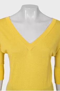 Yellow pullover with a cutout on the back
