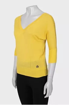 Yellow pullover with a cutout on the back