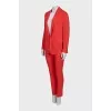 Suit of trousers and jacket on a hook