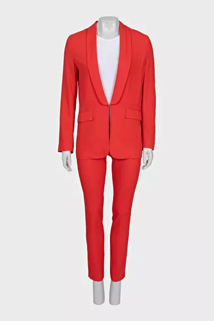 Suit of trousers and jacket on a hook