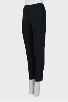 Green tapered trousers